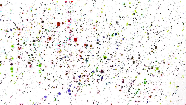 Abstract pattern of colorful splashes of watercolor paint on white background, festive splash of paint with bright, dynamic energy photo