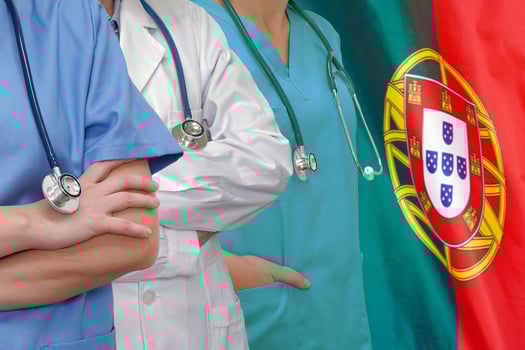 Three Doctors with stethoscope on Portugal flag photo