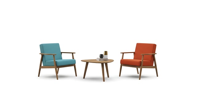 Two chairs and a table with a vase on top photo