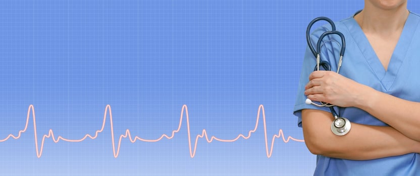 Female doctor or nurse with a stethoscope in the hands and ecg line on medical blue background. Health care banner. photo