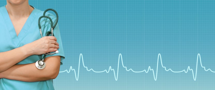 Female doctor or nurse with a stethoscope in the hands and ecg line on medical green background. Health care banner. photo