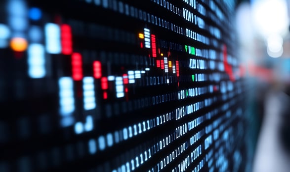 Stock market data screen, city backdrop, night trading photo