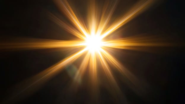 Golden sunburst, dark background, light rays, design element photo