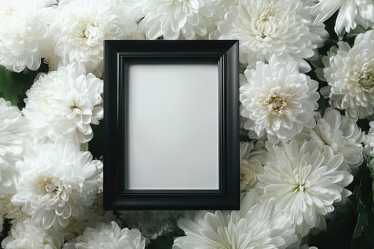 White flowers and black frame with copy space photo