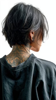 A woman with a tattoo on her back photo