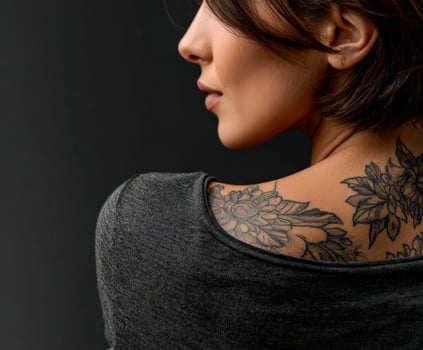 Woman With Floral Tattoos on her Back photo