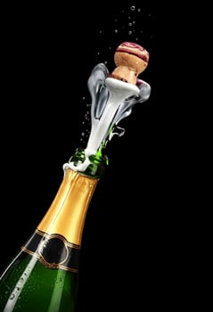 A bottle of champagne being opened with a cork photo