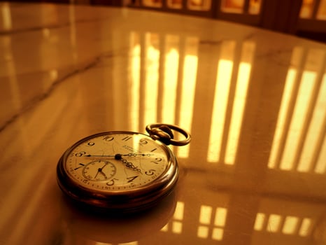 A clock on a table photo
