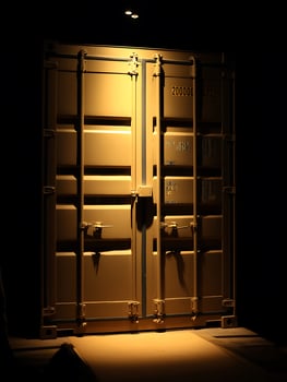 Illuminated Cargo Container at Night Industrial Shipping and Logistics. photo