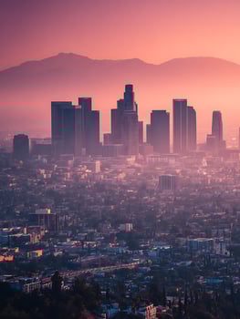 Los Angeles Skyline at Sunset A Panoramic View of Downtown and Surrounding Cityscape. photo