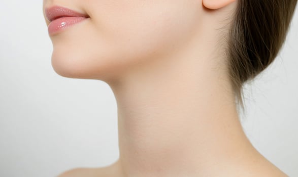 Womans neck and chin, profile, skincare, studio, beauty photo