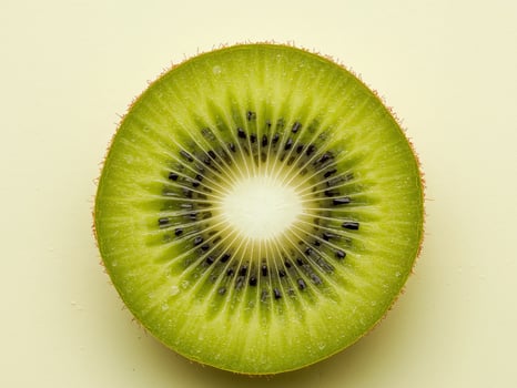 Sliced kiwi showing vibrant green interior photo