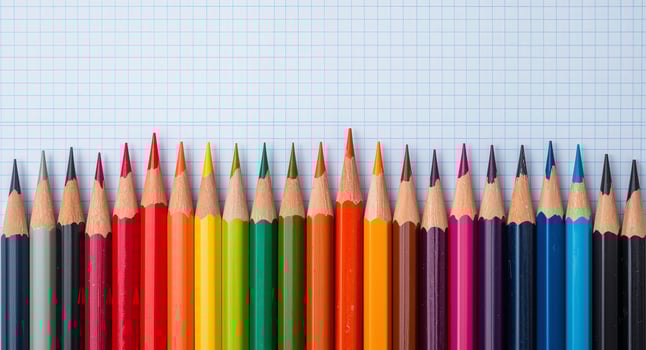 Colorful pencils on graph paper photo