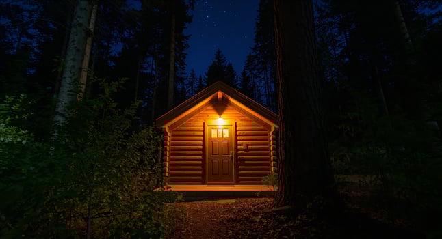 cabin illuminated at night photo
