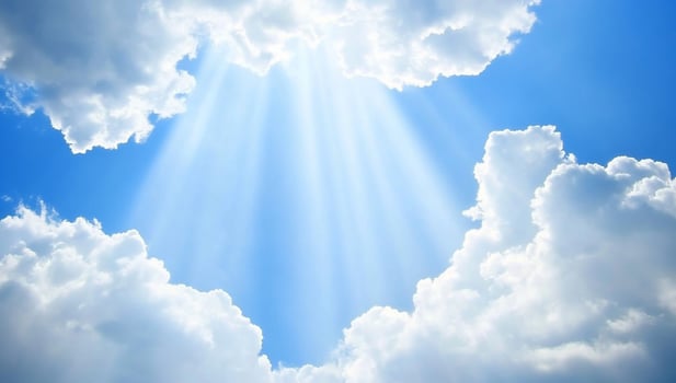 Heavenly sunbeams pierce clouds, bright blue sky background, inspirational photo