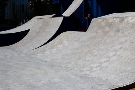 Street ramps for performing tricks on skateboard or bike. Equipment for extreme pastime. Ramp for jumping and stunt. Getting adrenaline and new emotions on street ramp photo