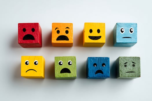 Colorful Wooden Blocks with Diverse Facial Expressions Representing Emotions photo