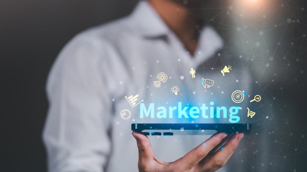 Digital marketing strategy concept with holographic icons above smartphone, representing online advertising, sales growth, brand promotion, and customer engagement in modern business. photo