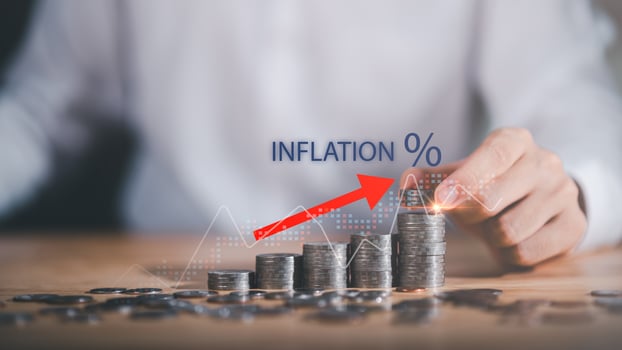 Financial inflation growth concept with stacked coins, red arrow increase, and digital data chart, representing rising cost, economy trends, financial pressure, and investment strategy planning. photo