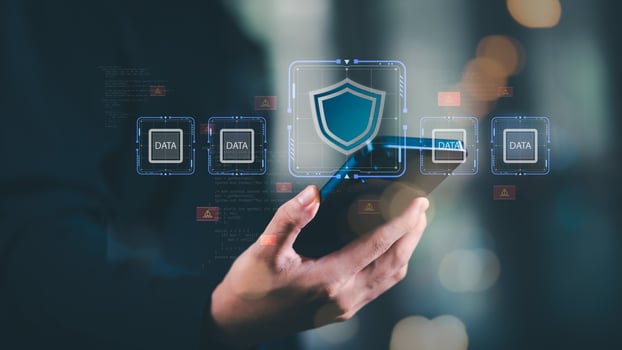 Mobile data protection concept with digital shield icon, secure information storage, and cybersecurity defense system for preventing hacking, breaches, and online threats ,encryption technology. photo