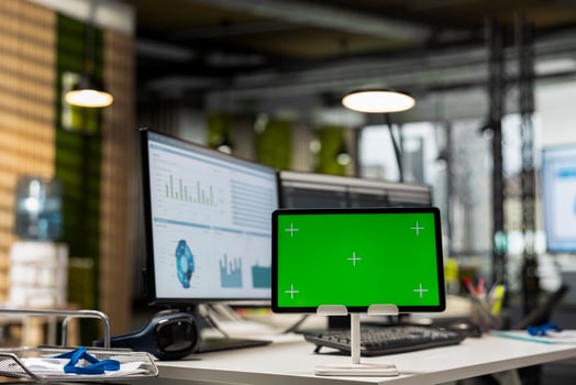 Empty company office features digital resources and copy space on tablet, space ready for report writing, strategy development and alignment of organizational objectives and goals achievement. photo