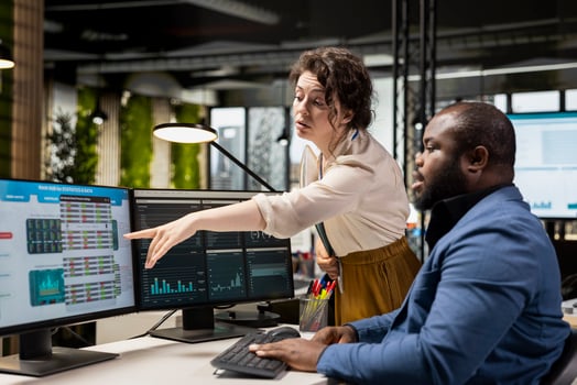 Colleagues engaging in discussion and consulting around performance metrics, leveraging insights to align objectives and achieve business goals efficiently in a multinational company. photo