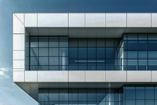 Modern Architectural Design of a Glass Building With Unique Features in a Clear Blue Sky photo