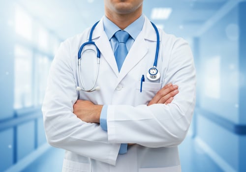 Confident Doctor with Stethoscope and Folded Arms in a Modern Hospital Setting photo
