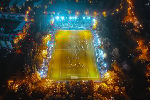 Vibrant aerial view of soccer stadium with colorful spectators and exciting game field photo
