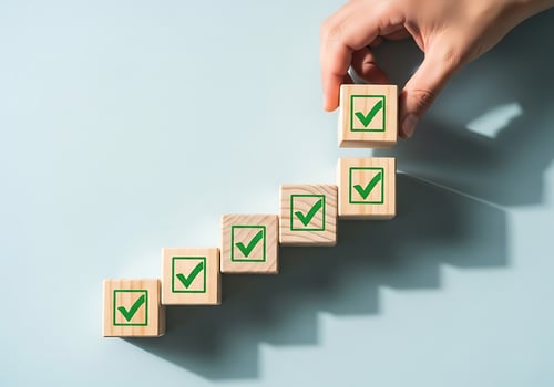 Progressive Checklist Cubes Showing Accomplishment and Successful Completion photo
