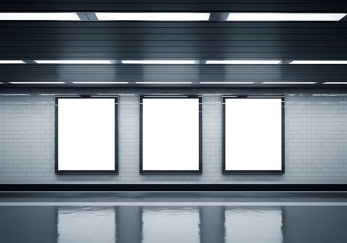Three Blank White Vertical Billboards in a Modern Underground Subway Station With Wet Reflective Floor photo