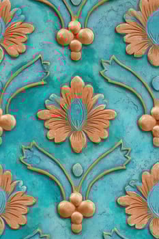 Ornate vintage tile with embossed copper flowers and turquoise patina creating a seamless pattern photo