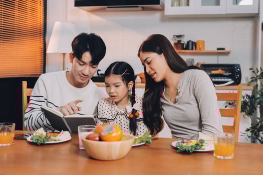 Family sharing a meal together photo