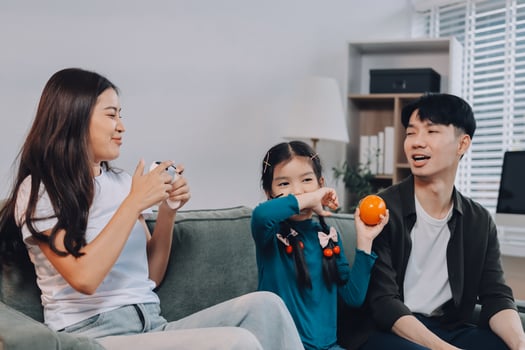 Family playing together at home photo