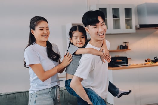 Family playing together at home photo