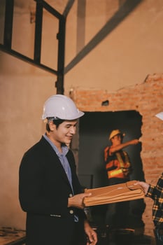 Construction workers discussing project details photo