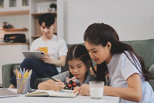Mother and daughter working on a project photo