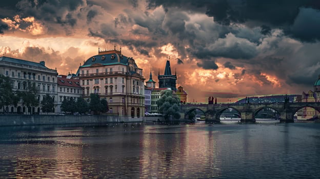 Cityscape reflection with architecture and river under dramatic sky photo