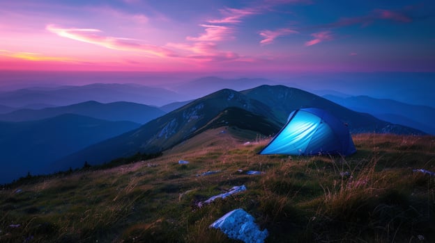 Camping tent on mountain peak at dusk scenic landscape photo