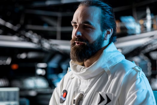 Close up of astronaut wearing spacesuit inside futuristic spacecraft launching into orbit. Spaceman engineer wearing equipment prepares for space travel operation of technology advancement photo
