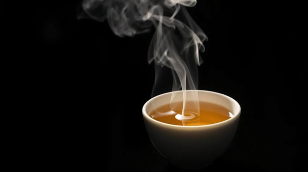 Steaming Cup of Tea Warm Beverage in Minimalist Setting Beverages photo