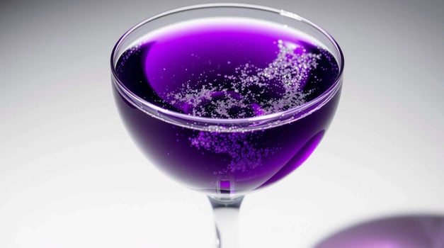 Vibrant Purple Cocktail in Coupe Glass Beverages photo