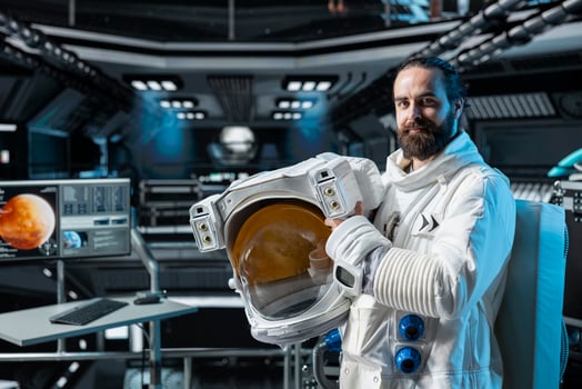 Portrait of cosmonaut preparing for mission on Mars, doing space colonization. Man in orbital station beginning landing procedures on red desert planet, mapping unknown worlds photo