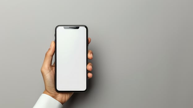 Hand holding smartphone with blank screen for app ui mockup and technology presentation photo