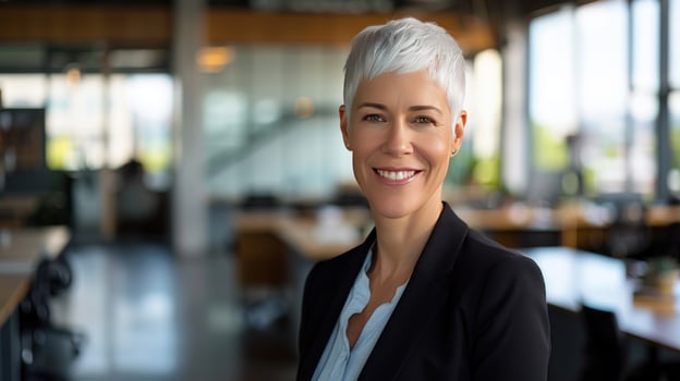 Professional woman portrait in a modern office setting with natural light photo