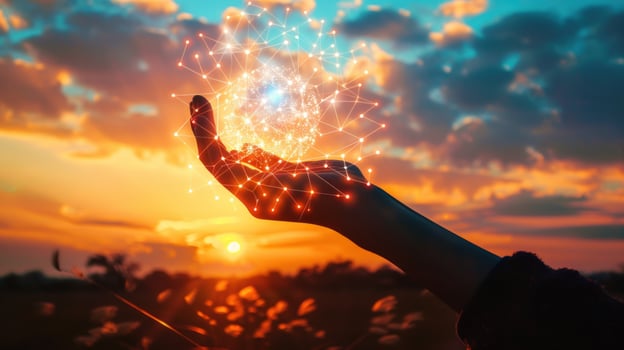 Connecting hand holding a digital network sphere at sunset sky technology concept photo