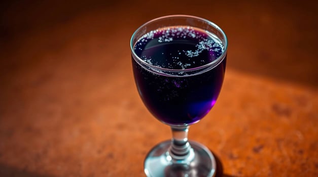 Vibrant Purple Drink in Glass CloseUp Product Shot Beverages photo