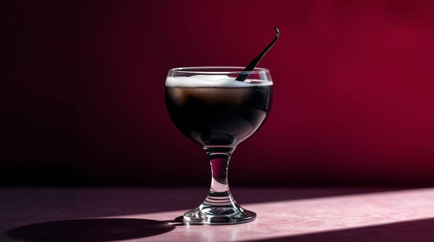 Black Cocktail with Vanilla Bean Dark Beverage in Elegant Glassware Beverages photo