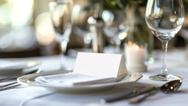 Elegant table setting with blank card for special occasion celebration photo