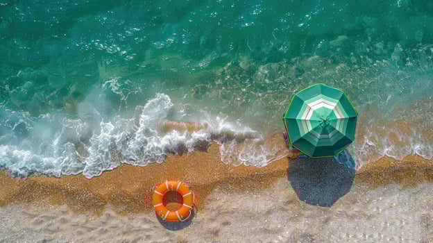 Turquoise sea beach with umbrella and lifebuoy aerial view vacation concept photo
